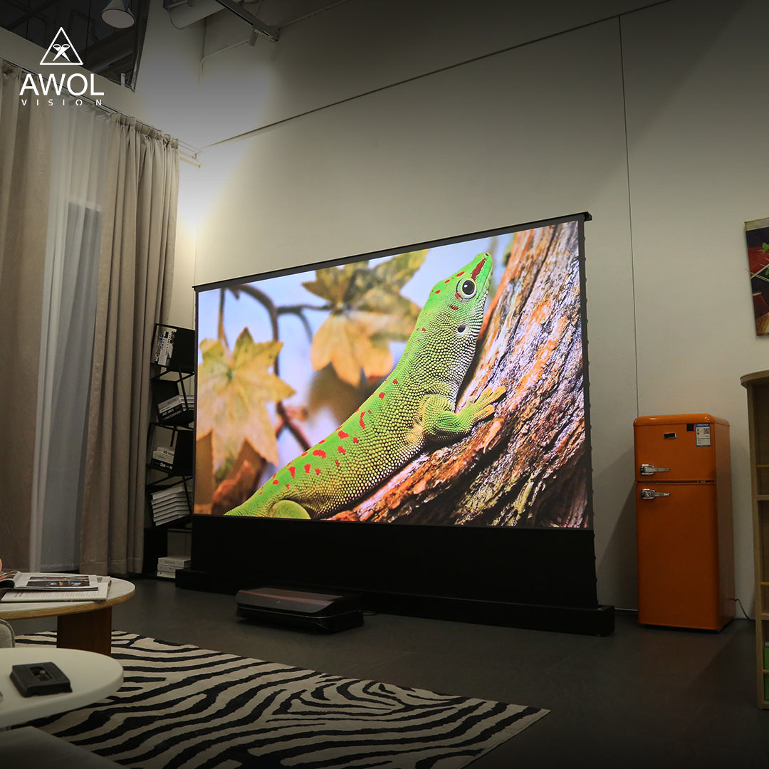 Vivid green lizard on a tree captured in stunning detail on AWOL Vision's high-definition projector screen.