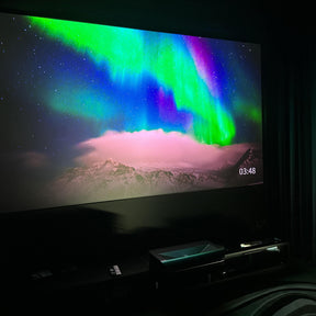 Cinematic ALR screen showcasing vibrant northern lights, designed for use with UST projectors.