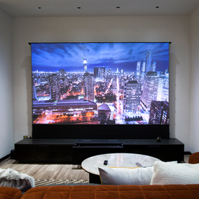 The living room features the LTV-3500 Pro 4K laser projector, motorized screen, and smart cabinetry for a cinematic experience.